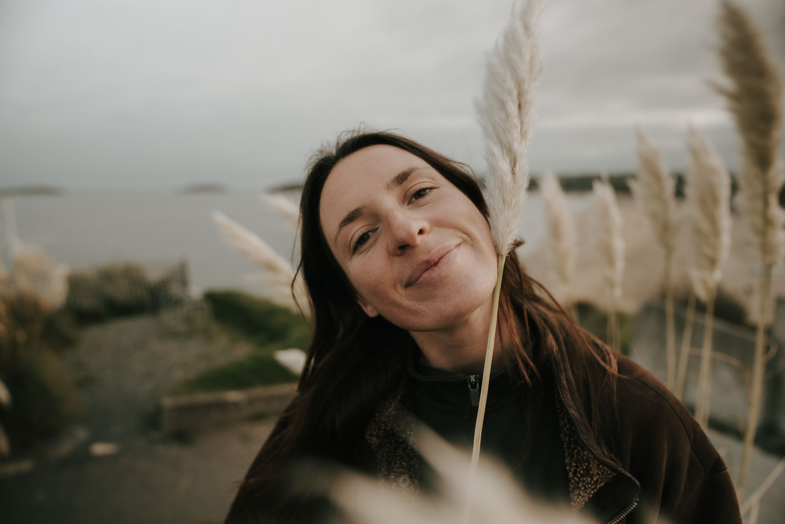 Portrait outdoors among grasses from the Rachel Knowles portfolio